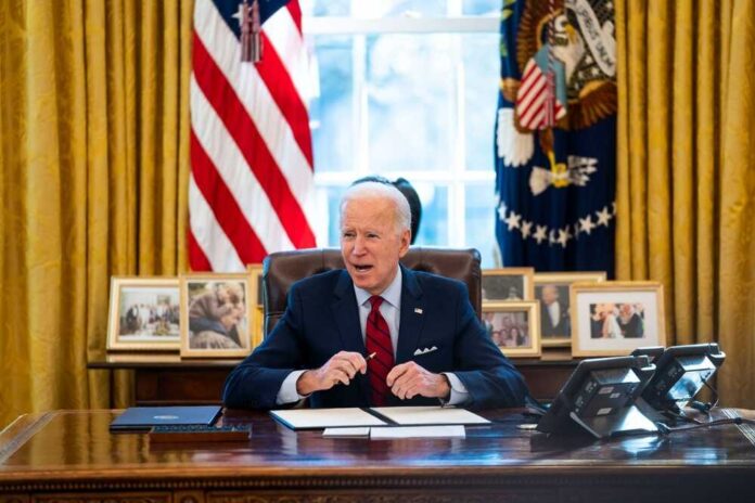 U.s.president,Joe,Biden,Signs,Executive,Actions,In,The,Oval,Office