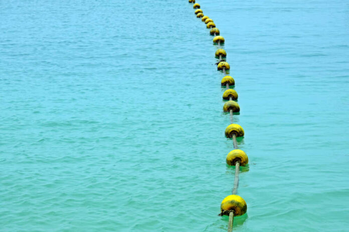 Floating,Border,Marks,In,The,Sea.