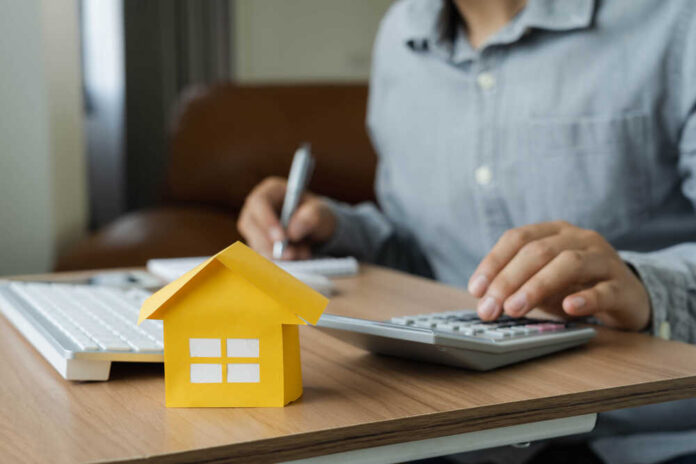 Business,Finance,Concept.,Close,Up,Yellow,Paper,House,Model,With