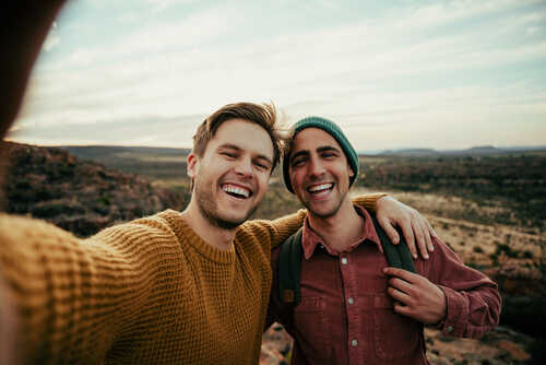 Caucasian,Male,Friends,Hiking,In,Wilderness,Taking,Selfie,With,Cellular