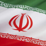 Iranian flag with green, white, red stripes.