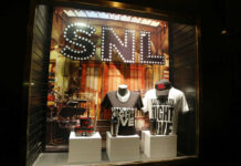 SNL merchandise display in a store window