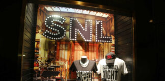 SNL merchandise display in a store window