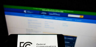 FCC logo on smartphone and computer screen.