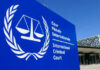 International Criminal Court sign with scales of justice.