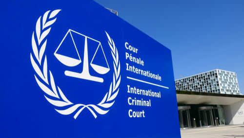 International Criminal Court sign with scales of justice.