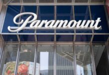 Paramount’s Warner Bid Sparks Antitrust Fury Paramount sign displayed on a building exterior