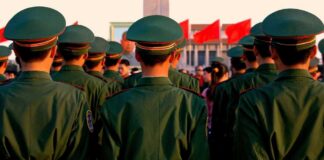 Group of uniformed soldiers standing in formation during a ceremony