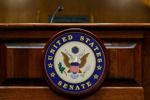 us-senate2379495897jpg United States Senate emblem on wooden podium
