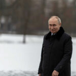 man in black winter coat