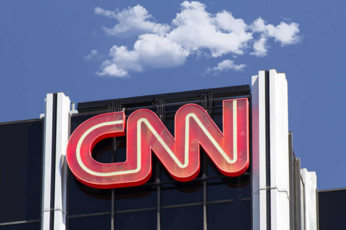 CNN building sign and blue sky background