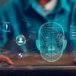 DHS Bio-Data Deal EXPLODES Privacy Fears Person holding tablet displaying digital face graphics