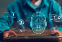 Person holding tablet displaying digital face graphics