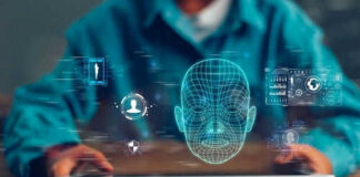 Person holding tablet displaying digital face graphics