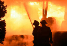 Firefighters battling intense blaze at night