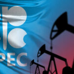 UAE Breaks Free: Oil Market Revolution? OPEC logo in front of an abstract flag background with oil rigs silhouettes