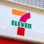 7-Eleven Shuts 500+ Stores Amid Economic Squeeze 7-Eleven store sign featuring the logo