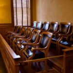 D.C. Juries Rigged? Ex-Obama U.S. Attorney Sparks Fury Empty jury box with wooden chairs in a courtroom