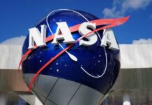 NASA logo displayed on a large globe structure