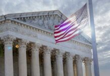 Sotomayor’s Bold Attack on Kavanaugh BACKFIRES The Supreme Court building with an American flag waving in front