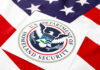 Department of Homeland Security seal on American flag