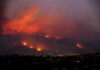 Google Maps ERASING History with Pre-Fire Images Wildfire glows on hills above a city at dusk