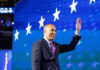 Democratic Leader Jeffries’ STUNNING Attack on VA Court Person waving in front of a starry blue background
