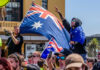 Australia Targets Hate: 15-Year Jail Threat Crowd with Australian flags at an outdoor rally
