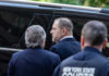 Hollywood Mogul Weinstein Collapses: Hospitalized Amid Trial A judge's hand holding a gavel in a courtroom setting