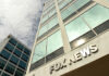 Exterior view of a modern office building with the sign 'FOX NEWS'