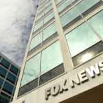 Fox News Doctor Tapped for Major Health Role Exterior view of a modern office building with the sign 'FOX NEWS'