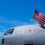 Massive Reward for ACCUSED US Traitor Monica Witt! Close-up of a military aircraft with an American flag