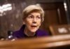A woman in a purple blazer speaking during a senate hearing