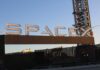 SpaceX’s Fireball Success: A Planned Masterstroke? Sign displaying the SpaceX logo at a launch site