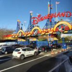 Massive Disney Lawsuit — Face Scans Gone TOO FAR? Entrance to Disneyland with cars waiting in line