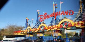 Entrance to Disneyland with cars waiting in line