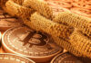 Bitcoin coins and digital binary code chain.