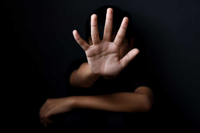 abuse-children-or-human-trafficking2345146037jpg Person with open hand raised toward camera