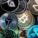 Various cryptocurrency coins with different symbols displayed