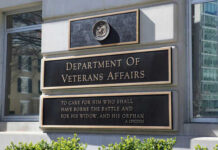 WOKE Programs Scrapped — Veterans First Department of Veterans Affairs building exterior sign