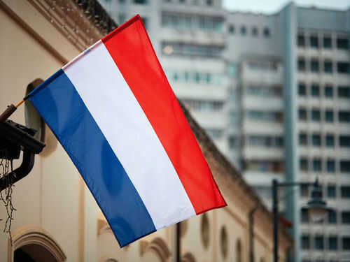france1674918262 Netherlands flag waving outside buildings