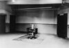 Shocking Reversal Hits Alabama Executions Interior view of a courtroom with wooden benches and large murals