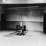 Shocking Reversal Hits Alabama Executions Interior view of a courtroom with wooden benches and large murals