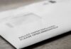 Ballot envelope on a wooden surface