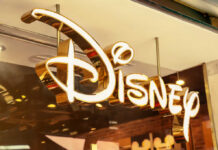 Disney store illuminated gold sign