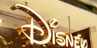 Disney store illuminated gold sign