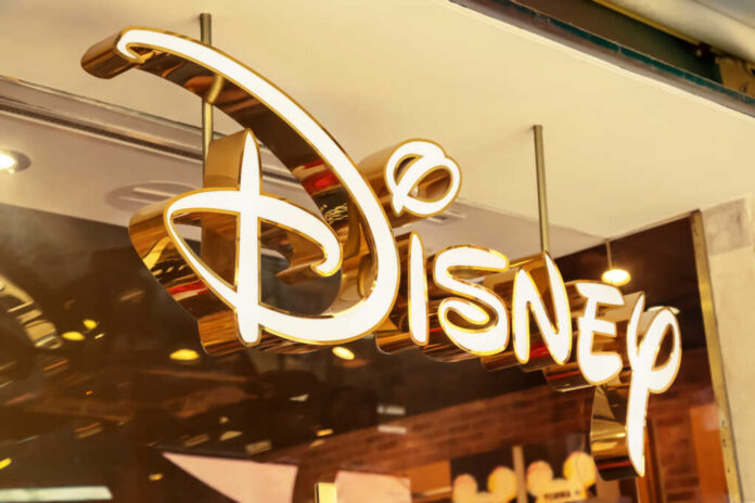 Disney store illuminated gold sign