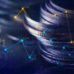 Stacked coins with financial data overlay graphs