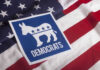 Working-Class Costume, Progressive Agenda? Democrats symbol on American flag background