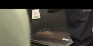 Passengers on American Airlines flight recount laptop fire that spurred emergency landing